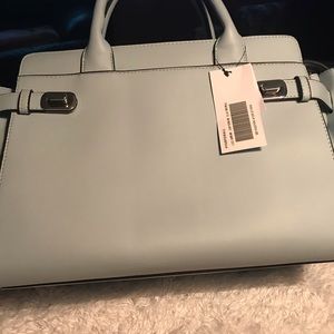 Purse.Shoulder strap and handles. Dusty blue.